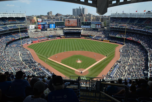 Wide view of a professional baseball stadium during a game—ideal backdrop for enjoying drinks with Aldicom hangover relief ready for the next day.